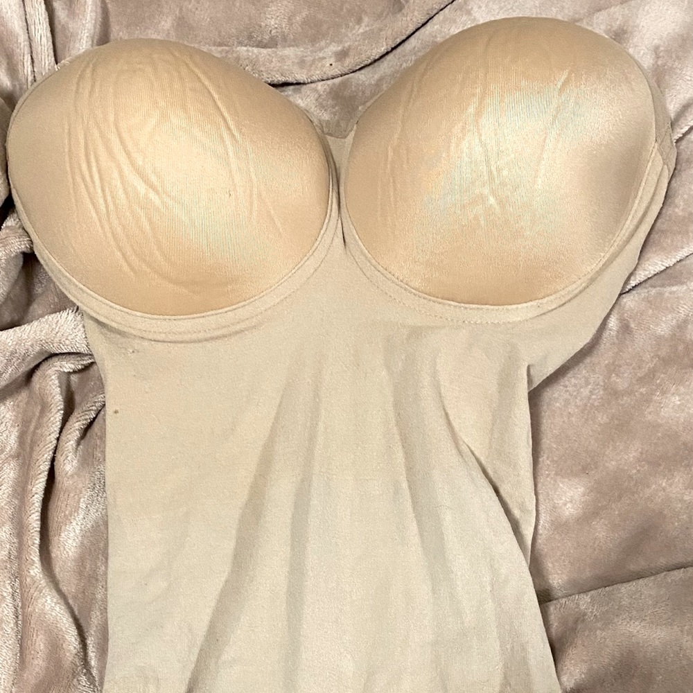 Never worn body shaper.I bought for my wedding but I was gifted aSPANX instead.